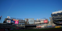A picture of John Sterling is displayed on the screen at Yankee Stadium, on the day he died, Monday, May 4, 2026. Sterling was the voice of the Yankees for more than 35 years.