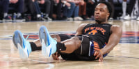 May 6, 2026; New York, New York, USA; New York Knicks forward Og Anunoby (8) falls to the court after missing a shot against the Philadelphia 76ers during game five of the second round of the 2026 NBA Playoffs at Madison Square Garden. Mandatory Credit: Wendell Cruz-Imagn Images