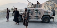 Taliban security personnel stand guard near the Torkham border crossing between Afghanistan and Pakistan on Feb. 27, 2026. 