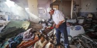 A Palestinian man inspects the site of an Israeli military operation in an apartment in Gaza City, on June 4, 2026. 
