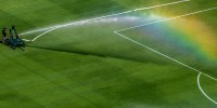 A rainbow is seen on the pitch at halftime as the grounds crew waters the grass during the FIFA Club World Cup 2025.