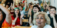 Spectators react at the Iran vs. New Zealand World Cup game watch party at Meymuni Cafe in Los Angeles on June 15, 2026.