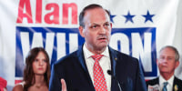 Alan Wilson speaks at a podium