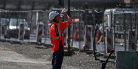 A worker drinks water a construction site in Bordeaux, southwestern France on June 22, 2026, as France experiences a ferocious heatwave.