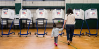 A voter arrives to cast their ballot at a polling location.