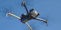 An FBI drone flies in the sky