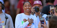 Oct 11, 2025; Los Angeles, California, USA; USC Trojans basketball player JuJu Watkins was on hand as she was named the tunnel captain the the game against the Michigan Wolverines at United Airlines Field at the Los Angeles Memorial Coliseum. Mandatory Credit: Jayne Kamin-Oncea-Imagn Images