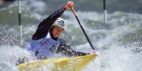 David Hearn maneuvers a canoe on the water