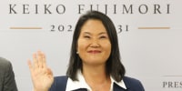 Peru's president-elect for the Fuerza Popular party, Keiko Fujimori, waves as she gives a statement at her campaign headquarters in the San Borja district of Lima on July 3.
