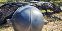 The Australian Space Agency is advising Queensland authorities and the National Emergency Management Agency following the discovery of several unidentified objects at Forrest Beach.