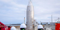 A photo shows the RV-X, a small Reusable Vehicle Experiment.