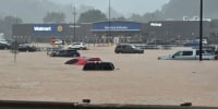 A flooded Walmart parking lot in Weston, W.Va.