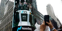 A billboard of SpaceX is pictured on the day of SpaceX's initial public offering (IPO) at the Nasdaq MarketSite, in New York City.