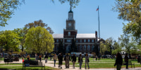 Students walk through the campus of Howard University.
