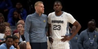 Apr 3, 2026; Memphis, Tennessee, USA; Memphis Grizzlies head coach Tuomas Iisalo talks with forward Cedric Coward (23) during the second quarter against the Toronto Raptors at FedExForum. Mandatory Credit: Petre Thomas-Imagn Images