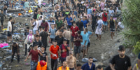 Hundreds of migrants reach Spain's Ceuta after swimming from Morocco