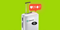 A suitcase with Open AI logo stickers and an Instagram-style notification alert showing 29 likes and 17 comments.