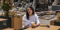 Image: Zlatoslava Supruniuk poses for a portrait outside McDonald's