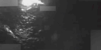 An animated video depicting a vessel in the water before and after an airstrike.
