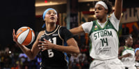 COLLEGE PARK, GEORGIA - JULY 31: Angel Reese #5 of the Atlanta Dream drives to the basket against Dominique Malonga #14 of the Seattle Storm during the first quarter at Gateway Center Arena on July 31, 2026 in College Park, Georgia. NOTE TO USER: User expressly acknowledges and agrees that, by downloading and or using this photograph, User is consenting to the terms and conditions of the Getty Images License Agreement. (Photo by Colin Hubbard/Getty Images)