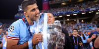 ISTANBUL, TURKEY - JUNE 10: Rodri of Manchester City celebrates with the Champions League Trophy during the UEFA Champions League 2022/23 final match between FC Internazionale and Manchester City FC at Ataturk Olympic Stadium on June 10, 2023 in Istanbul, Turkey. (Photo by James Gill - Danehouse/Getty Images)