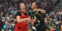 Aug 2, 2026; Portland, Oregon, USA; Portland Fire forward Emily Engstler (21) and Los Angeles Sparks forward Dearica Hamby (5) battle for position during the first half at Moda Center. Mandatory Credit: Jaime Valdez-Imagn Images