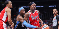 Aug 3, 2026; Atlanta, Georgia, USA; Atlanta Dream guard Rhyne Howard (10) defends Las Vegas Aces guard Jackie Young (0) in the first quarter at State Farm Arena. Mandatory Credit: Brett Davis-Imagn Images