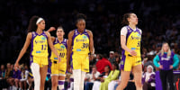 LOS ANGELES, CALIFORNIA - JUNE 21: Rae Burrell #12 of the Los Angeles Sparks, Kelsey Plum #10, Nneka Ogwumike #30 and Dearica Hamby #5 walk on the court during a break in the fourth quarter against the New York Liberty at Crypto.com Arena on June 21, 2026 in Los Angeles, California. (Photo by Melina Pizano/Getty Images)