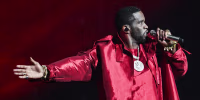 Sean "Diddy" Combs performs on stage, wearing all red