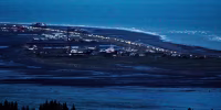 Headlights shine as people evacuate the Spit in Homer, Alaska, following a powerful earthquake in the Aleutian Islands that prompted a tsunami warning on July 22, 2020. 