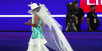 Naomi Osaka makes grand entrance and big fashion statement at Australian Open