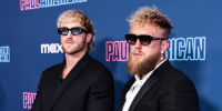 Logan Paul, left, and Jake Paul stand for portraits on the red carpet