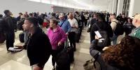 Long wait lines at a TSA checkpoint at New York's LaGuardia airport on March 27, 2026.