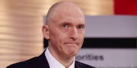 Carter Page participates in a discussion at the One America News studios in 2019.