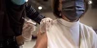 A Clinic Administers Fourth Doses Of Covid-19 Vaccine Booster