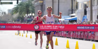 Feb 3, 2024; Orlando, FL, USA; Conner Mantz (right) and Clayton Young place first and second in 2:09:05 and 2:09:06 during the US Olympic Marathon Team Trials. Mandatory Credit: Kirby Lee-USA TODAY Sports