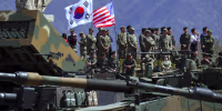 Image: South Korean and US soldiers watching from an observation post during a joint live firing drill between South Korea and the US at the Seungjin Fire Training Field in Pocheon, northeast of Seoul