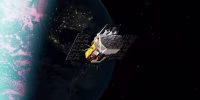 NASA’s Neil Gehrels Swift Observatory, shown in this artist’s concept, has orbited Earth for more than 20 years, studying the ever-changing universe.