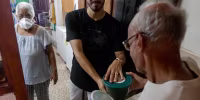People give food to church goers.