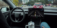A Tesla Robotaxi view from the inside of the car.