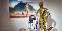 Sculptures of Protocol droid C-3PO, right, and astromech droid R2-D2