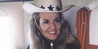 Image: Dee Brock in her younger years, wearing a cowboy hat and smiling.