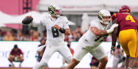 Oregon quarterback Dylan Raiola throws a pass as the Oregon Ducks face the USC Trojans on Sept. 26, 2026, at Los Angeles Memorial Coliseum in Los Angeles, California.