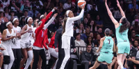 Sep 21, 2026; Brooklyn, New York, USA; Atlanta Dream forward DeWanna Bonner (24) takes a three-point shot past New York Liberty forward Breanna Stewart (30) in the third quarter at Barclays Center. Mandatory Credit: Wendell Cruz-Imagn Images