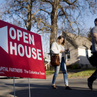 Potential Buyers Attend An Open House Ahead Of Existing Home Sales Figures