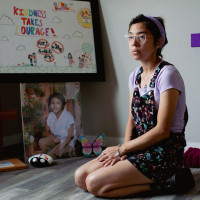 Jessica Hernandez sits in a room of her new home that is filled with photos, drawings and tributes to her daughter, Alithia Haven Ramirez, a victim of the Uvalde school shooting last year. Jessica still can't say the word "shooting" out loud.