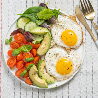 Breakfast with eggs and avocado