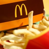 Big Mac box and french freis are seen on a restaurant table in this illustration photo taken in Krakow, Poland on June 25, 2023.