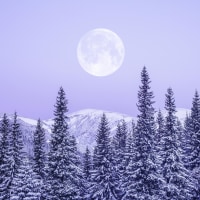 february full moon in snowy mountains