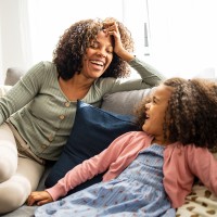 Mother and daughter at home talking